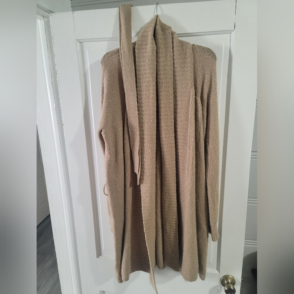 Tan woman's cardigan